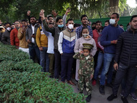 People queue up outside the residence of India's Chief of Defence Staff General Bipin Rawat, who died in a helicopter crash, to pay their la...