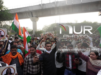 People gather near Brar Square in Delhi cantonment, where India's Chief of Defence Staff General Bipin Rawat will be cremated with full mili...