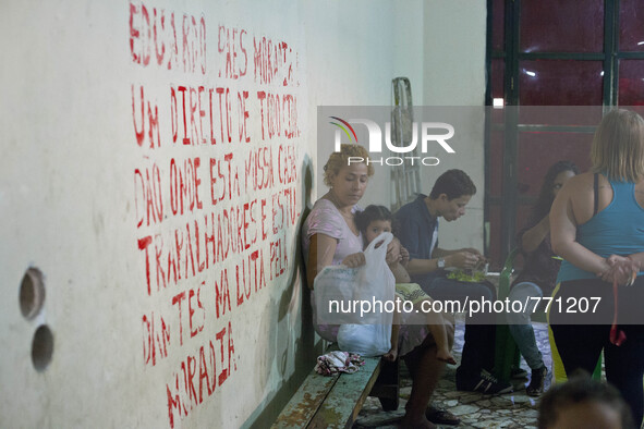 The Lobby of the Planatu Hotel. This is were the families spend time with their children and prepare meals. The wall reads "Eduardo Paes! Ho...