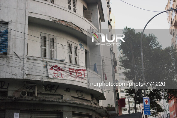 The exterior of the Planatu Hotel, the building has been adorned with banners from the activists that live there and assist the families...