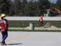 Employees working in the construction of the new "Felipe Ángeles" International Airport, are seen during a press tour in the facilities of t...