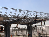 Employees working in the construction of the new "Felipe Ángeles" International Airport, are seen during a press tour in the facilities of t...