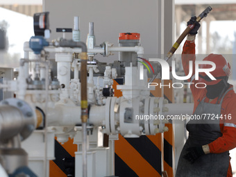 Employees working in the construction of the new "Felipe Ángeles" International Airport, are seen during a press tour in the facilities of t...