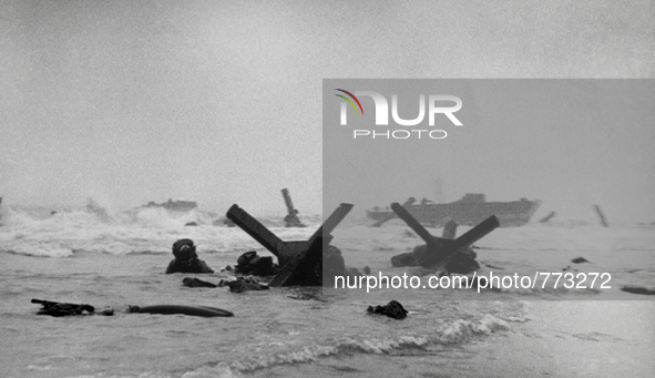 FRANCE Omaha Beach -- 06 Jun 1944 -- US Army and US Navy assault troops in the early morning of D-Day on Omaha Beach in Normandy France. The...