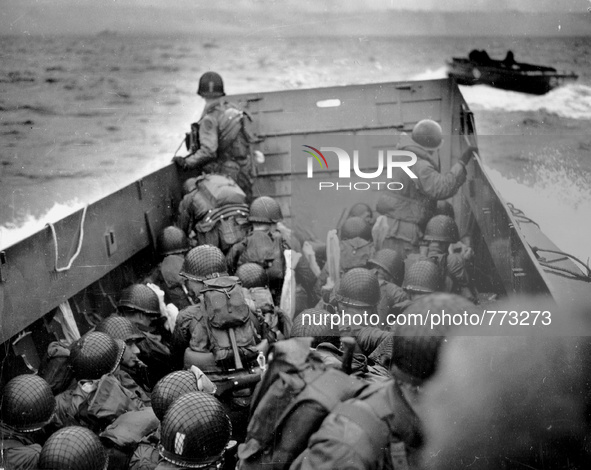 FRANCE Omaha Beach -- 06 Jun 1944 -- A US Navy landing craft approaches Omaha Beach in Normandy France with US Army and US Navy assault troo...