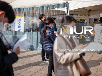 Citizens wait for the results of the COVID-19 test in front of Seoul Metropolitan Government Hall on February 9, 2022 in Seoul, South Korea....