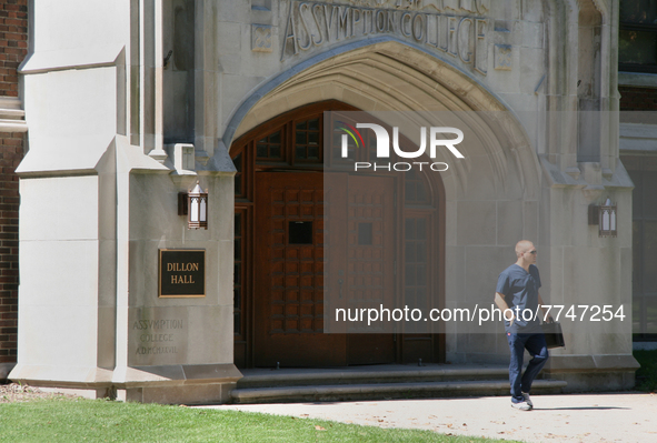 Student outside Dillon Hall at the Assumption College building of the University of Windsor in Ontario, Canada. 