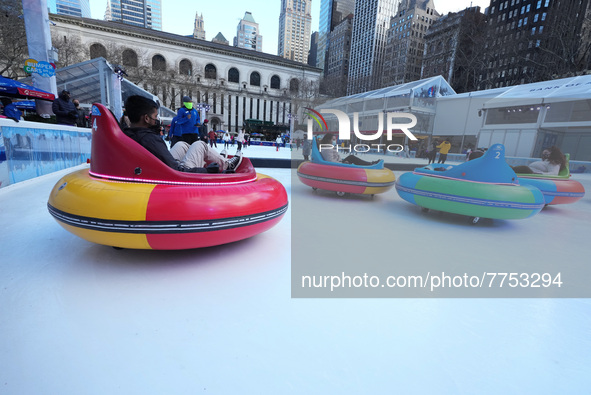 People ride ice-bumper cars at The Rink at Bank of America Winter Village at Bryant Park on February 10, 2022 in New York City. Despite a re...