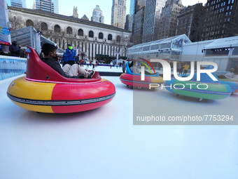 People ride ice-bumper cars at The Rink at Bank of America Winter Village at Bryant Park on February 10, 2022 in New York City. Despite a re...