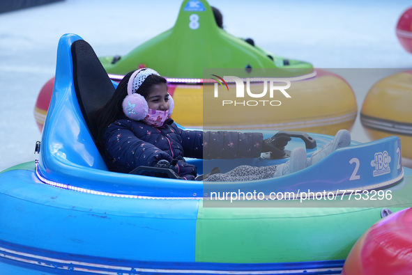 People ride ice-bumper cars at The Rink at Bank of America Winter Village at Bryant Park on February 10, 2022 in New York City. Despite a re...