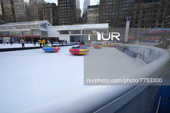 People ride ice-bumper cars at The Rink at Bank of America Winter Village at Bryant Park on February 10, 2022 in New York City. Despite a re...