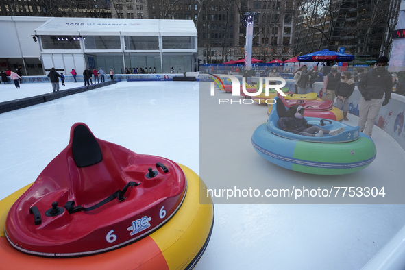 People ride ice-bumper cars at The Rink at Bank of America Winter Village at Bryant Park on February 10, 2022 in New York City. Despite a re...