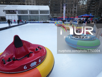 People ride ice-bumper cars at The Rink at Bank of America Winter Village at Bryant Park on February 10, 2022 in New York City. Despite a re...