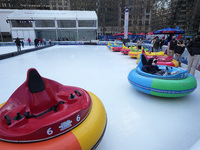 People ride ice-bumper cars at The Rink at Bank of America Winter Village at Bryant Park on February 10, 2022 in New York City. Despite a re...