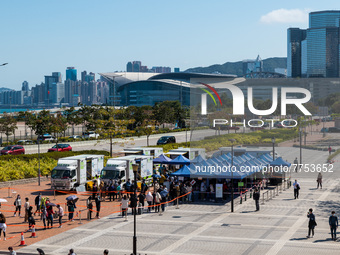 People queue up at an open air testing ground at Endinburgh Place in Central Hong Kong, China, on February 11, 2022.    (