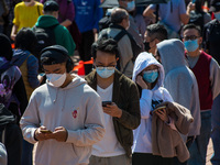 People queue at a temporary COVID test centre in Edinburgh Place in Central Hong Kong, China, on February 11, 2022.        (