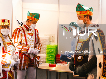 cologne Triumvirate are seen inside the lab with a medical staff at vaccine station at Lanxess Arena in , Germany on Feb 12, 2022 a week bef...