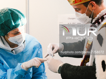 cologne Triumvirate are seen inside the lab with medical staff at vaccine station at Lanxess Arena in , Germany on Feb 12, 2022 a week befor...