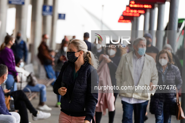 People arrive at Santa Cruz de Tenerife bus station on 13 February 2022. 