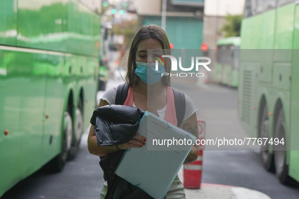 A woman arrives at Santa Cruz de Tenerife bus station on 13 February 2022. 