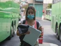 A woman arrives at Santa Cruz de Tenerife bus station on 13 February 2022. (