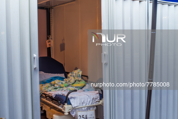 A makeshift cabin with an empty bed can be seen at Queen Elisabeth hospital, in Hong Kong, China, on February 17, 2022.  