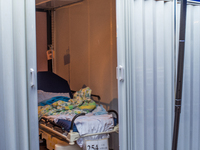 A makeshift cabin with an empty bed can be seen at Queen Elisabeth hospital, in Hong Kong, China, on February 17, 2022.  (