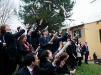 Students of Scuola Superiore San'Anna-university celebrate their diplomas in Pisa, Italy, on February 19, 2022.  Ceremony for the awarding o...