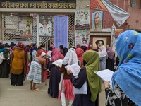 Student complete their last revision befor honors exam in front of a college in Dhaka Bangladesh on February 20, 2022.
 (