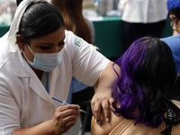 A person receives the Sputnik-V dose booster   inside Sport City facilities, during the mass vaccination campaign for citizens of 18 - 29 ye...