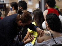 A person receives the Sputnik-V dose booster   inside Sport City facilities, during the mass vaccination campaign for citizens of 18 - 29 ye...