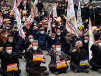 Farmers shout slogans during the National Farmers' Congress hold in front of the Korea Development Bank in Yeouido, Seoul, on February 25 20...