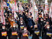 Farmers shout slogans during the National Farmers' Congress hold in front of the Korea Development Bank in Yeouido, Seoul, on February 25 20...