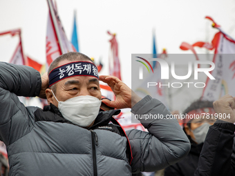 Farmers shout slogans during the National Farmers' Congress hold in front of the Korea Development Bank in Yeouido, Seoul, on February 25 20...