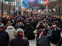 Farmers shout slogans during the National Farmers' Congress hold in front of the Korea Development Bank in Yeouido, Seoul, on February 25 20...