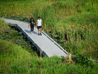 People are seen walking around the Benchakitti Forest Park on February 27, 2022 in Bangkok, Thailand. As Thailand COVID-19 situation today,...