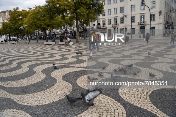 People are seen walking around Praça de Rossio, Lisbon. February 20, 2022. The Portuguese General Health Direction (DGS) has registered 2,79...