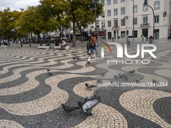 People are seen walking around Praça de Rossio, Lisbon. February 20, 2022. The Portuguese General Health Direction (DGS) has registered 2,79...