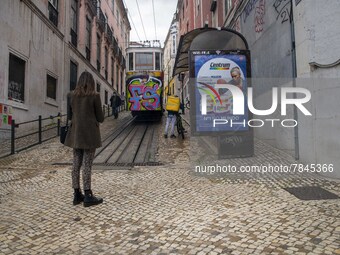 A person is seen walking near the Gloria elevator in the Restauradores neighborhood, Lisbon. February 20, 2022. The Portuguese General Healt...