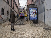 A person is seen walking near the Gloria elevator in the Restauradores neighborhood, Lisbon. February 20, 2022. The Portuguese General Healt...