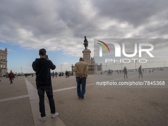 People are seen walking around Praça de Comercio, Lisbon. February 20, 2022.  The Portuguese General Health Direction (DGS) has registered 2...