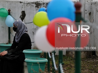 A student wearing hijab sits outside the principal office at Government Higher secondary girls school in Baramulla Jammu and Kashmir India o...