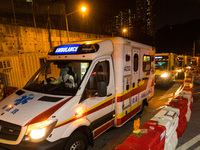 Up to 6 ambulances waited in line to drop patients at United Christian Hospital in Kwun Tong, in Hong Kong, China, on March 04, 2022. (