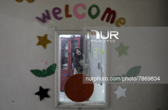 Palestinian students attend a class at a private school in Gaza City, on March 6, 2022. 