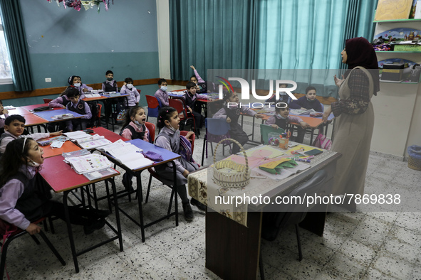 Palestinian students attend a class at a private school in Gaza City, on March 6, 2022. 