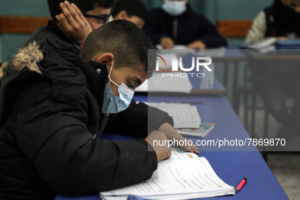 Palestinian students attend a class at a private school in Gaza City, on March 6, 2022. 