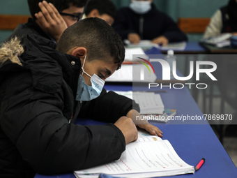 Palestinian students attend a class at a private school in Gaza City, on March 6, 2022. (