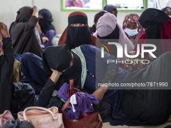 Rohingya refugees take a rest at temporary shelter in Alue Buya Pasie village after strandet on a beach in Bireuen regency, Aceh province on...