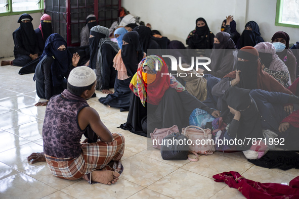 Rohingya refugees take a rest at temporary shelter in Alue Buya Pasie village after strandet on a beach in Bireuen regency, Aceh province on...