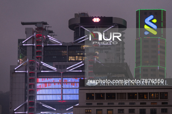 The buildings of the Mandarin Oriental hotel, HSBC bank and Standard Chartered bank can be seen next to each other, in Hong Kong, China, on...